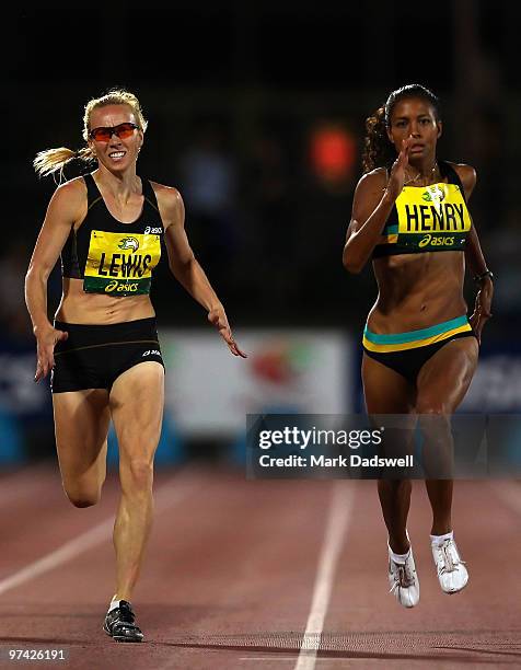 Tamsyn Lewis of VIC battles out the finish of the Womens 400 Metres with the winner Jody Henry of the WAIS during the IAAF Melbourne Track Classic at...