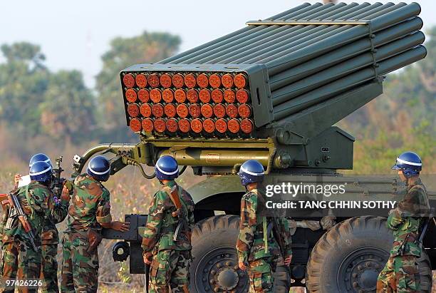 Cambodian soldiers prepare to test fire a multiple rocket launcher at the air field in Kampong Chhnang province, some 120 kilometers northwest of...