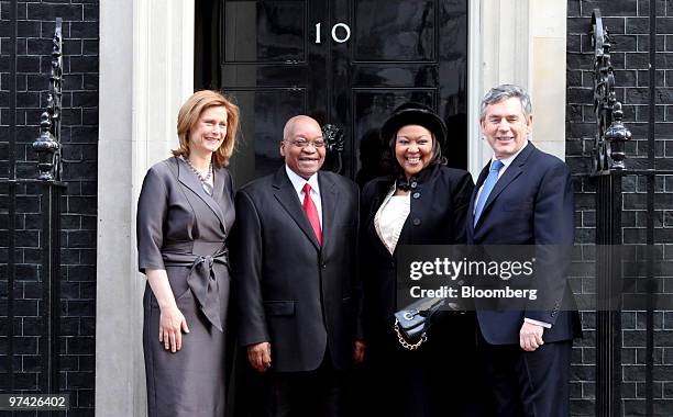 Gordon Brown, U.K. Prime minister, far right, and his wife Sarah, far left, greet Jacob Zuma, South Africa's president, second left, and his wife...