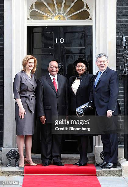 Gordon Brown, U.K. Prime minister, far right, and his wife Sarah, far left, greet Jacob Zuma, South Africa's president, second left, and his wife...