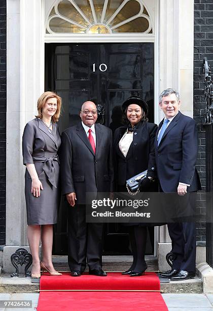 Gordon Brown, U.K. Prime minister, far right, and his wife Sarah, far left, greet Jacob Zuma, South Africa's president, second left, and his wife...