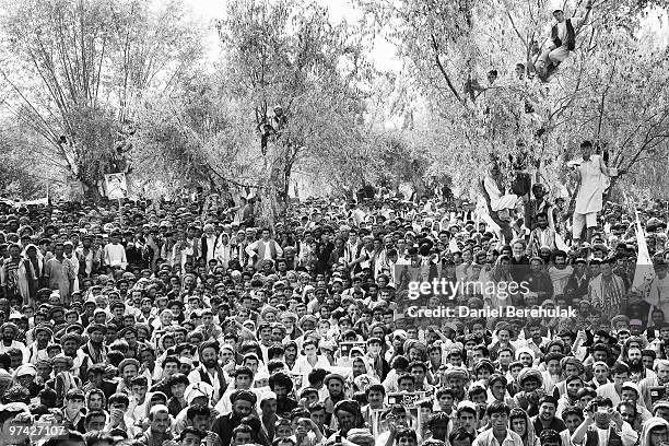 Supporters gather to listen to Afghan presidential candidate and former foreign minister Dr Abdullah Abdullah in his heartland province of Takhar on...