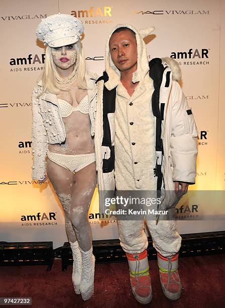 Viva Glam spokesperson Lady Gaga and Terence Koh walk the red carpet at amfAR Gala at Cipriani 42nd Street on February 10, 2010 in New York City.