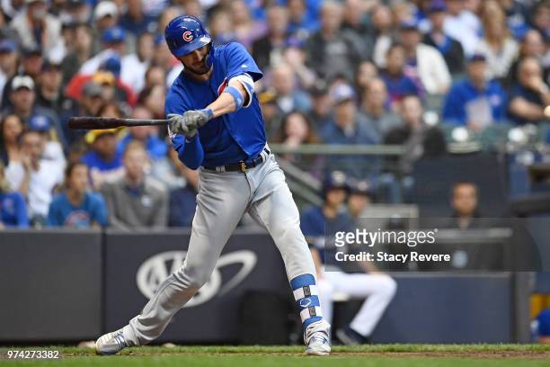 Kris Bryant of the Chicago Cubs at bat during a game against the Milwaukee Brewers at Miller Park on June 11, 2018 in Milwaukee, Wisconsin. The Cubs...