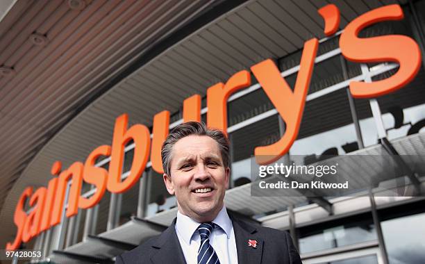 Of Sainsbury's Justin King prepares to greet South African President Jacob Zuma to a store in North Greenwich on March 4, 2010 in London, England.