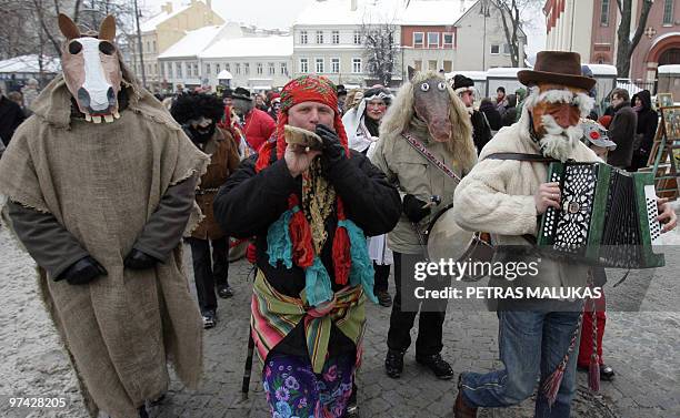 People celebrate �Uzgavenes� in the old town of Vilnius, on February 16, 2010. �Uzgavenes� is held before the beginning of the Christian Lent and is...