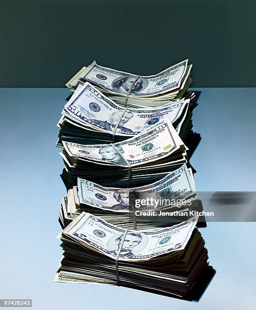 stacks of money - adac stock pictures, royalty-free photos & images