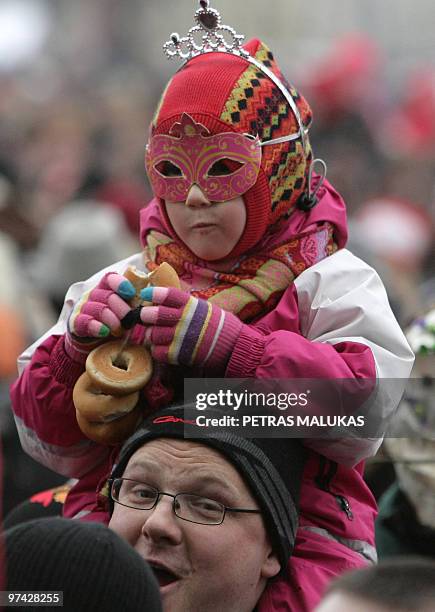 People attend Uzgavenes parade in Vilnius, on February 16, 2010. �Uzgavenes� is held before the beginning of the Christian Lent and is celebrated on...