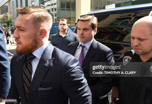 Mixed martial arts fighter Conor McGregor arrives at Brooklyn Supreme court in New York on June 14 stemming from his April attack on a bus at...