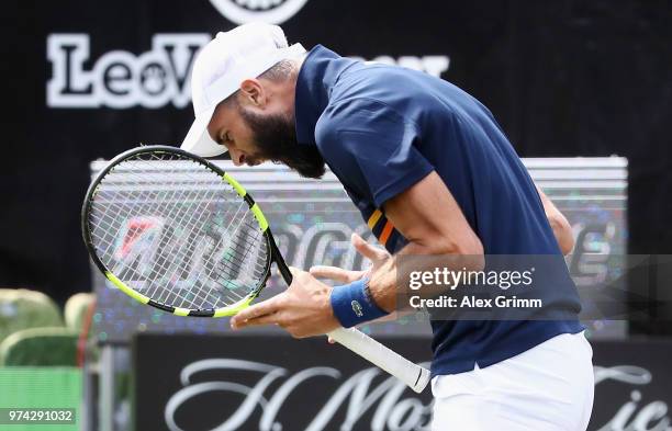 Benoit Paire of France react during his match against Tomas Berdych of Czech Republic during day 4 of the Mercedes Cup at Tennisclub Weissenhof on...