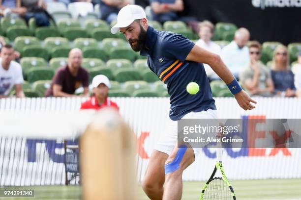 Benoit Paire of France plays a behind the back half-volley during his match against Tomas Berdych of Czech Republic during day 4 of the Mercedes Cup...