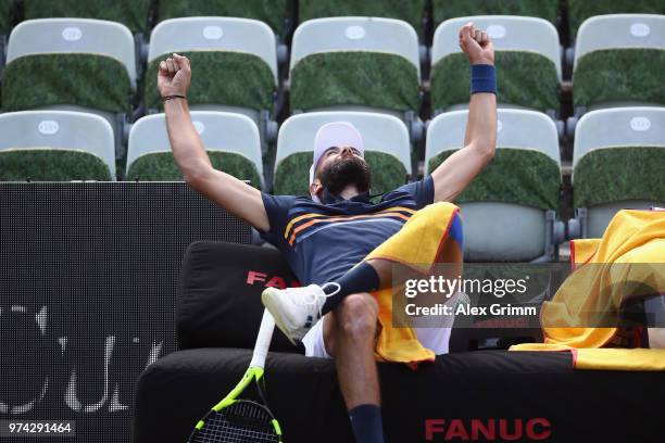 Benoit Paire of France reacts after playing a behind the back half-volley during his match against Tomas Berdych of Czech Republic during day 4 of...