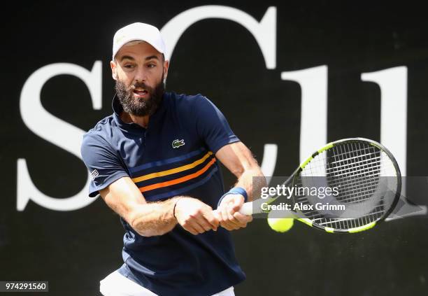 Benoit Paire of France plays a backhand to Tomas Berdych of Czech Republic during day 4 of the Mercedes Cup at Tennisclub Weissenhof on June 14, 2018...