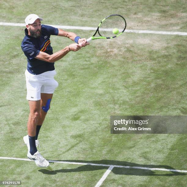 Benoit Paire of France plays a backhand to Tomas Berdych of Czech Republic during day 4 of the Mercedes Cup at Tennisclub Weissenhof on June 14, 2018...