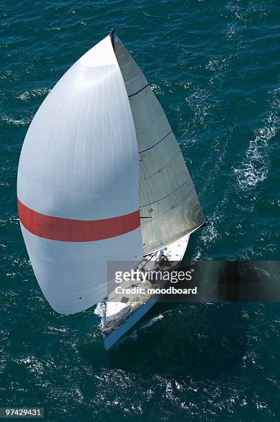 yacht competes in team sailing event, california - smooth sailing stock pictures, royalty-free photos & images