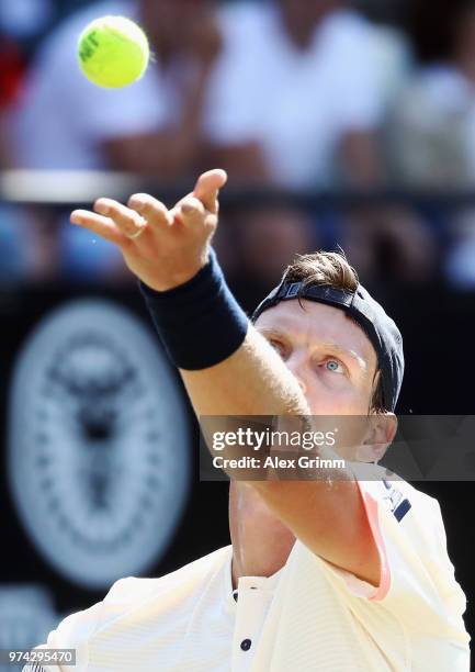 Tomas Berdych of Czech Republic serves the ball to Benoit Paire of France during day 4 of the Mercedes Cup at Tennisclub Weissenhof on June 14, 2018...