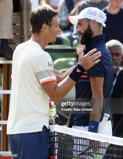 Tomas Berdych of Czech Republic shakes hands with Benoit Paire of France during day 4 of the Mercedes Cup at Tennisclub Weissenhof on June 14, 2018...