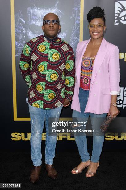 Alfonso Johnson and guest attend Opening Night Screening "Superfly" at the FIllmore Miami Beach during the 22nd Annual American Black Film Festival...