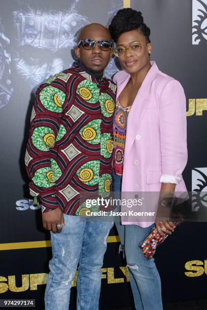 Alfonso Johnson and guest attend Opening Night Screening "Superfly" at the FIllmore Miami Beach during the 22nd Annual American Black Film Festival...