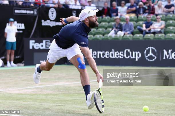 Benoit Paire of France attempts to reach the ball during his match against Tomas Berdych of Czech Republic during day 4 of the Mercedes Cup at...