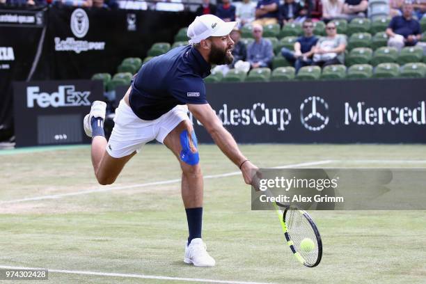 Benoit Paire of France attempts to reach the ball during his match against Tomas Berdych of Czech Republic during day 4 of the Mercedes Cup at...