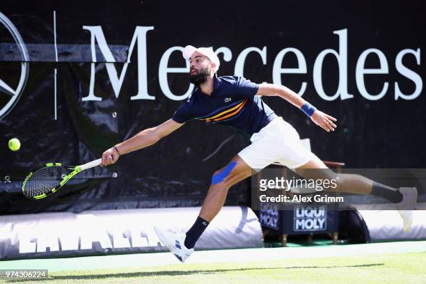 Benoit Paire of France attempts to reach the ball during his match against Tomas Berdych of Czech Republic during day 4 of the Mercedes Cup at...