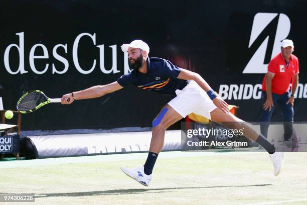 Benoit Paire of France attempts to reach the ball during his match against Tomas Berdych of Czech Republic during day 4 of the Mercedes Cup at...