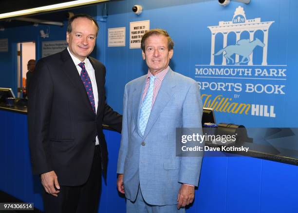 Of William Hill US Joe Asher and Chairman and CEO of Darby Development / Operator of Monmouth Park Dennis Drazin attend the William Hill Sports Book...