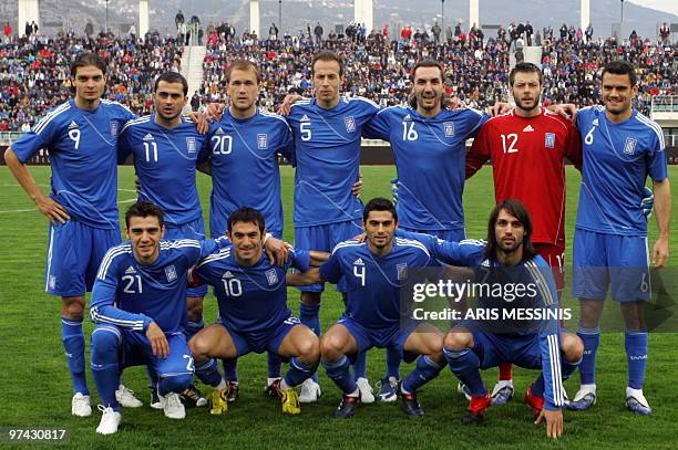 The Greek national football team pose before a friendly game against Senegal ahead of the 2010 World Cup in Volos on March 03, 2010. AFP PHOTO / ARIS...