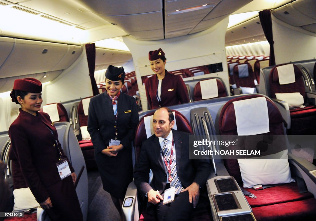 Qatar Airways CEO Akbar Al Baker (seated