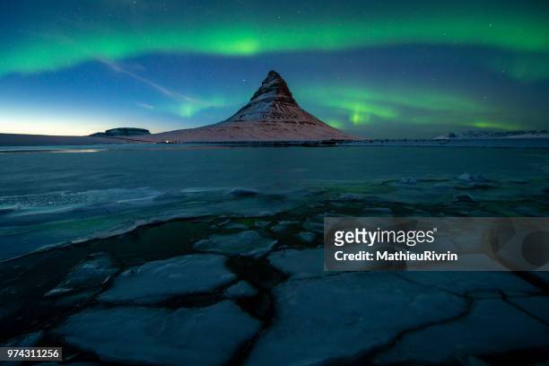 power of nature : amazing northern lights in iceland - snaefellsjokull glacier stock pictures, royalty-free photos & images