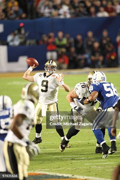 Drew Brees of the New Orleans Saints passes the ball during Super Bowl XLIV against the Indianapolis Colts at Sun Life Stadium on February 7, 2010 in...