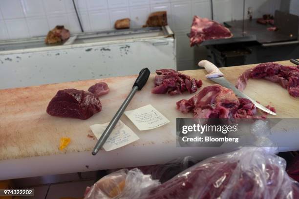 Pieces of meat sit on a counter while being prepared for sale at La Nueva Fortuna butcher shop in San Luis Potosi, Mexico, on Friday, June 8, 2018....