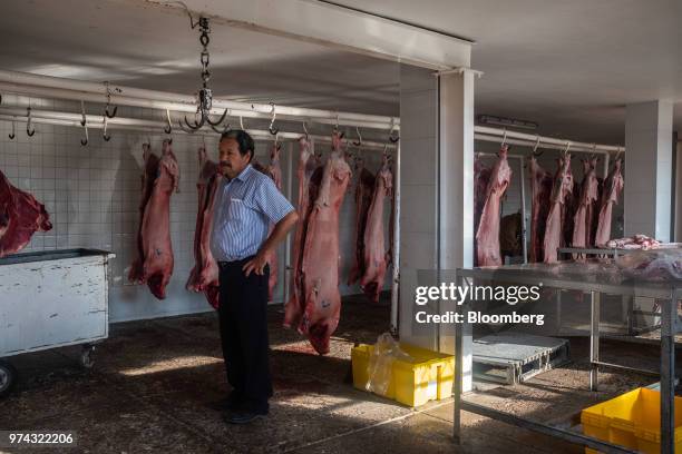 Butcher purchases pork at the Obrador Muoz meat wholesale and distribution center in San Luis Potosi, Mexico, on Friday, June 8, 2018. Mexico will...