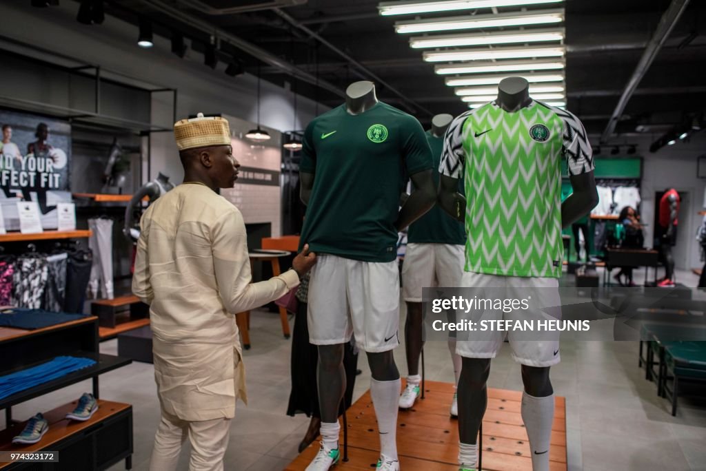 A man at a World Cup jerseys in a Nike in Lagos... News Photo - Getty Images