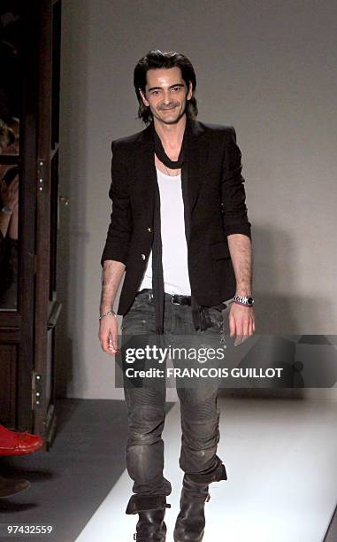French designer Christophe Decarnin acknowledges the public following the Balmain autumn-winter 2010/2011 ready-to-wear collection show on March 4,...