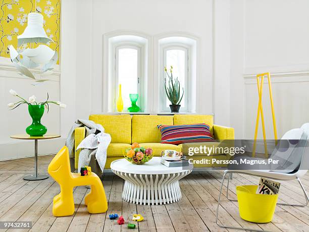 a light living room with yellow details, sweden. - home design colors stockfoto's en -beelden