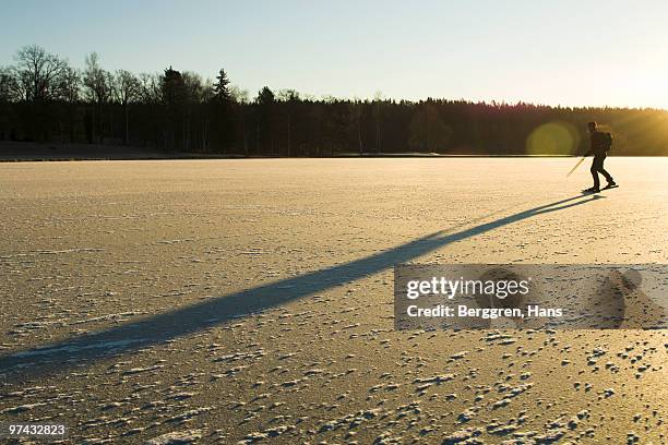 one person long-distance skating, sweden. - ウップランド ストックフォトと画像