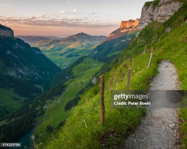 footpath to shrennenweg mountain in alps, wasserauen, appenzell innerrhoden, switzerland - appenzell innerrhoden stock pictures, royalty-free photos & images