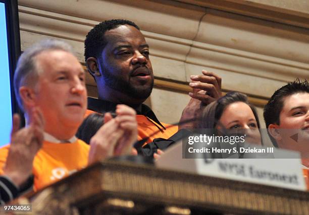 Chairman of National Kidney Foundation Bill Cella and Actor Grizz Chapman ring the opening bell at the New York Stock Exchange on March 4, 2010 in...