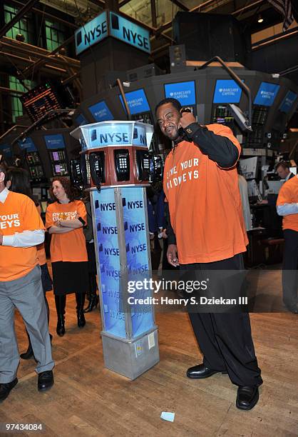 Actor Grizz Chapman poses for pictures on the trading floor after ringing the opening bell at the New York Stock Exchange on March 4, 2010 in New...