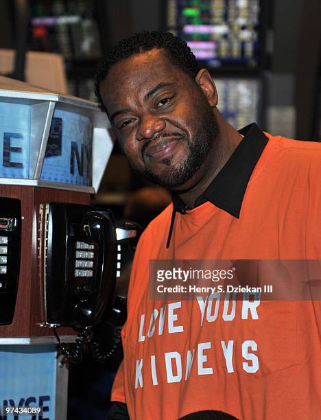 Actor Grizz Chapman poses for pictures on the trading floor after ringing the opening bell at the New York Stock Exchange on March 4, 2010 in New...