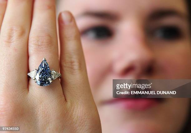 Carat pear-shaped internally flawless vivid blue diamond is displayed at Sotheby�s in New York, March 4, 2010. The diamond, formerly in the legendary...