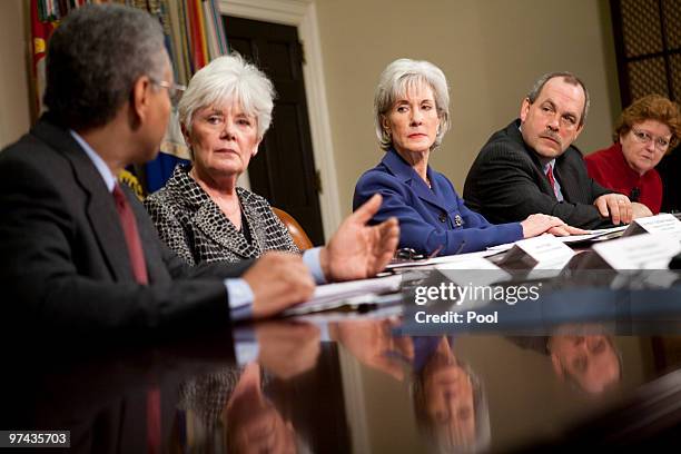 Aetna Chairman, CEO & President Ronald Williams speaks as Pennsylvania Insurance Commissioner Joel Ario , U.S. Health and Kansas Insurance...