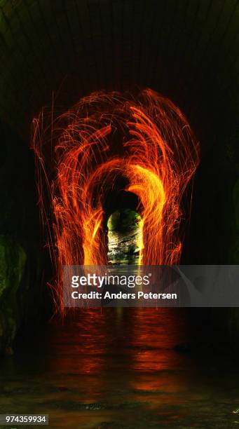 through the swirling fire - cave fire stock pictures, royalty-free photos & images