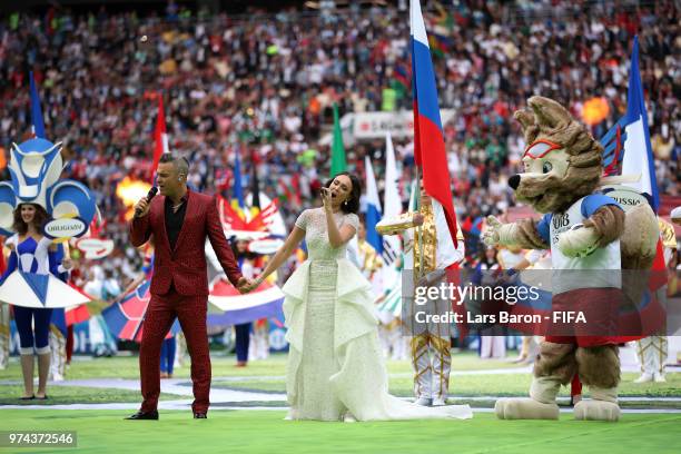 Singer Robbie Williams and Russian Soprano Aida Garifullina perform in the opening ceremony prior to the 2018 FIFA World Cup Russia Group A match...