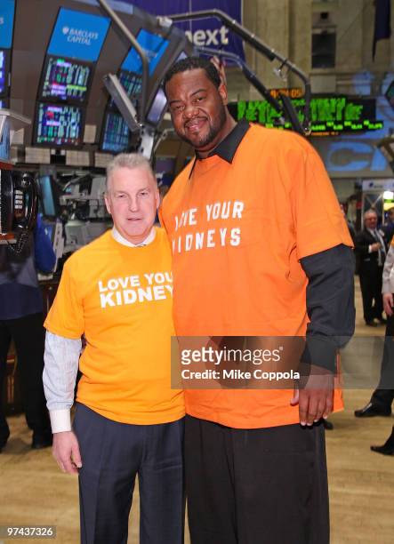 Chairman of National Kidney Foundation Bill Cella and actor Grizz Chapman rings the opening bell at the New York Stock Exchange on March 4, 2010 in...