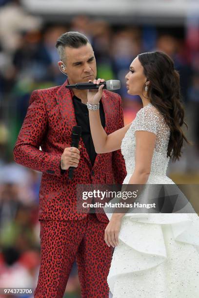 Robbie Williams and Aida Garifullina perform during the opening ceremony prior to the 2018 FIFA World Cup Russia Group A match between Russia and...