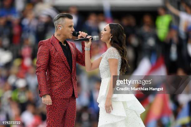 Robbie Williams and Aida Garifullina perform during the opening ceremony prior to the 2018 FIFA World Cup Russia Group A match between Russia and...