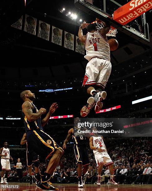 Derrick Rose of the Chicago Bulls leaps to dunk the ball against the Indiana Pacers at the United Center on February 24, 2010 in Chicago, Illinois....